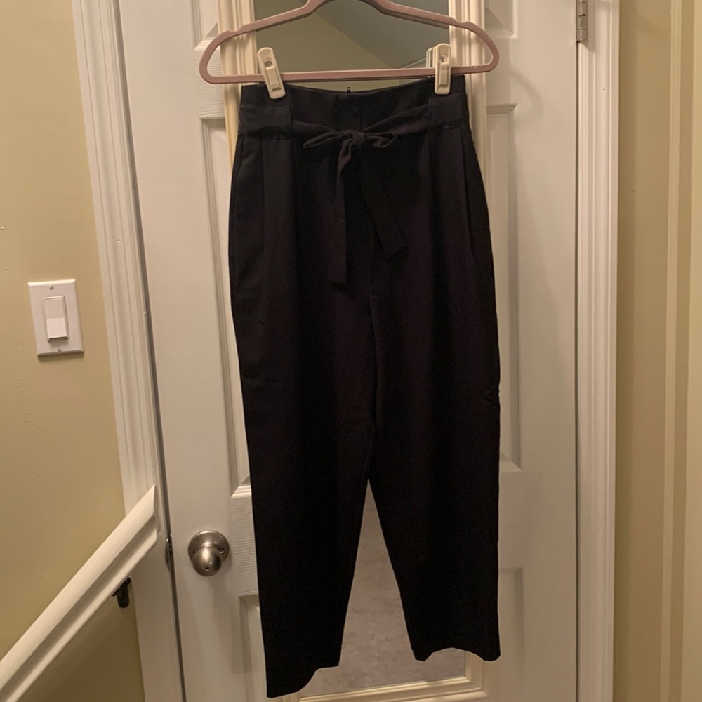 ASOS design high waist barrel type dress pants with tie waist.